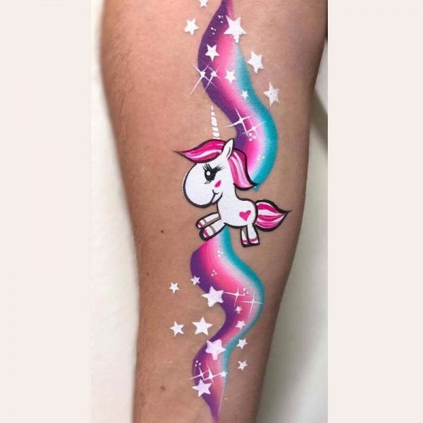 Unicorn face painting design by Emma Green using Diva stencil