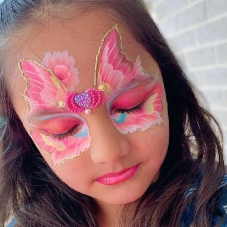 Butterfly face painting by Fairy Brooke using BLUSHING BROOKE 1 inch One-Stroke
