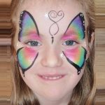 Butterfly face painting using Face Paint World's PASTEL PEARL Split-cake and RAKE brush