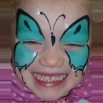 Butterfly face painting using TAG TEAL face paint