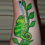Cameleon arm painting in TAG LIGHT GREEN and TAG GREEN face paint