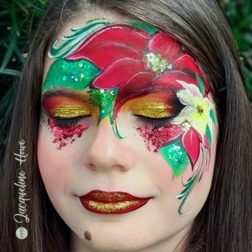 Christmas face painting by Jacqueline Howe using Cardinal and Evergreen Vivid Glitters