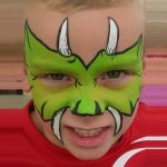 Dinosaur-face face painting using TAG LIGHT GREEN face paint