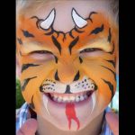 Dragon-Tiger face painting using Flora brush for stripes, nostrils, horns and fangs