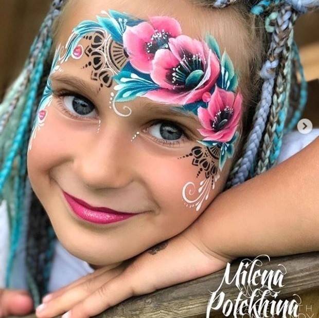 Flower face painting design by Milena Potekhina using Milena HENNA BEAUTY face painting stencil