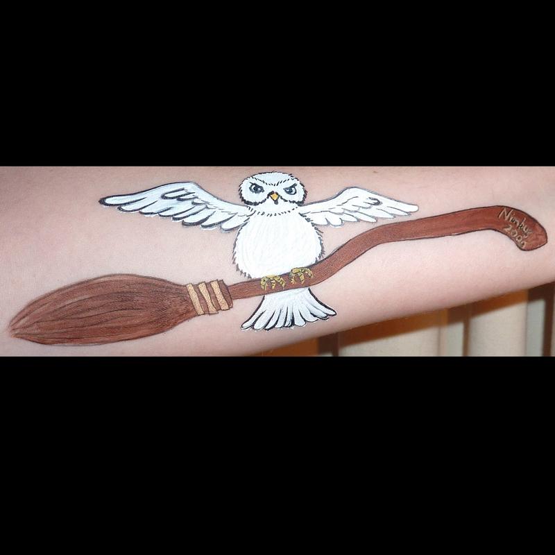 Harry Potter's owl and broomstick face painting using TAG BROWN face paint