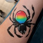 Rainbow Spider face painting using Face Paint World's RAINBOW LORIKEET one-stroke