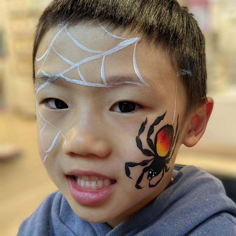 Red spider face painting using Face Paint World's FIREFLY one-stroke