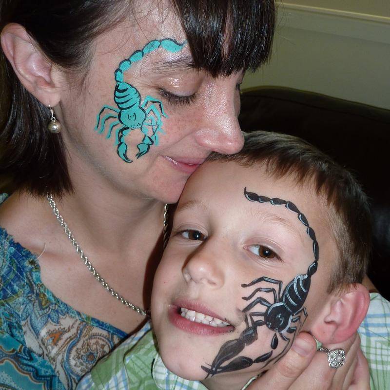Scorpion face painting using TAG TEAL face paint