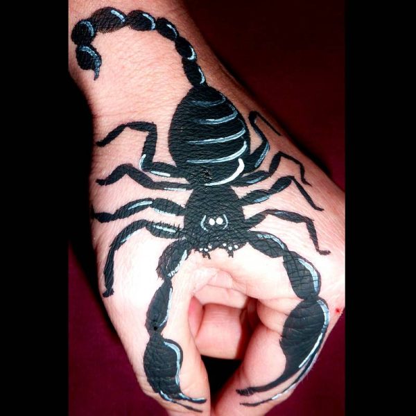 Scorpion hand painting in TAG BLACK face paint