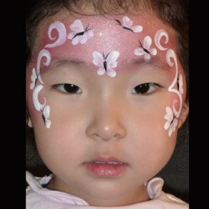 Simple Butterfly-Fairy face painting design in TAG Pearl Rose