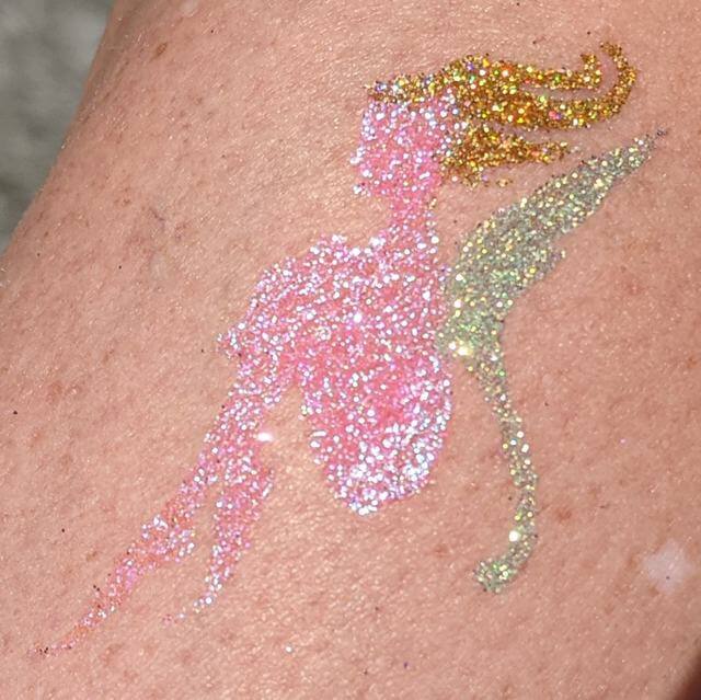 TAG Sitting Fairy Glitter Tattoo in ABA Bubblegum Pink glitter, ABA Faerie Wing glitter and TAG Holographic Gold glitter
