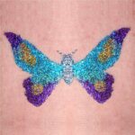 TAG Butterfly glitter tattoo with ABA Grape Soda glitter, ABA Royal Blue glitter, ABA Ocean Spray glitter, TAG Yellow Gold glitter and ABA Gunmetal glitter