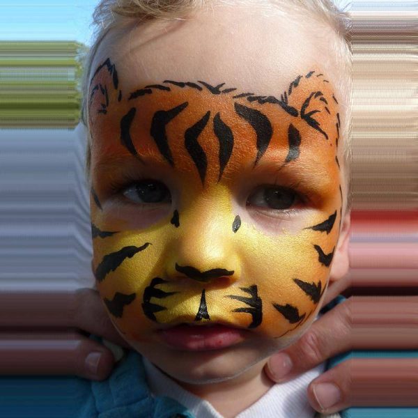 Tiger cub face painting using TAG Pearl ORANGE and Pearl YELLOW face paint