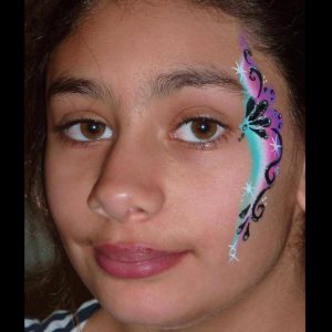 Tag Unicorn one-stroke face painting with silver glitter gel