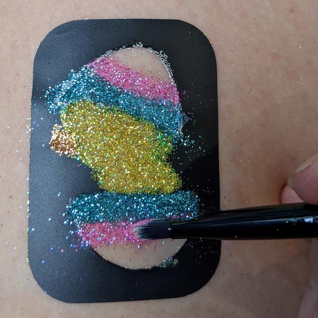 Use the narrow edge to create lines of different colours for amazing Glitter Tattoos